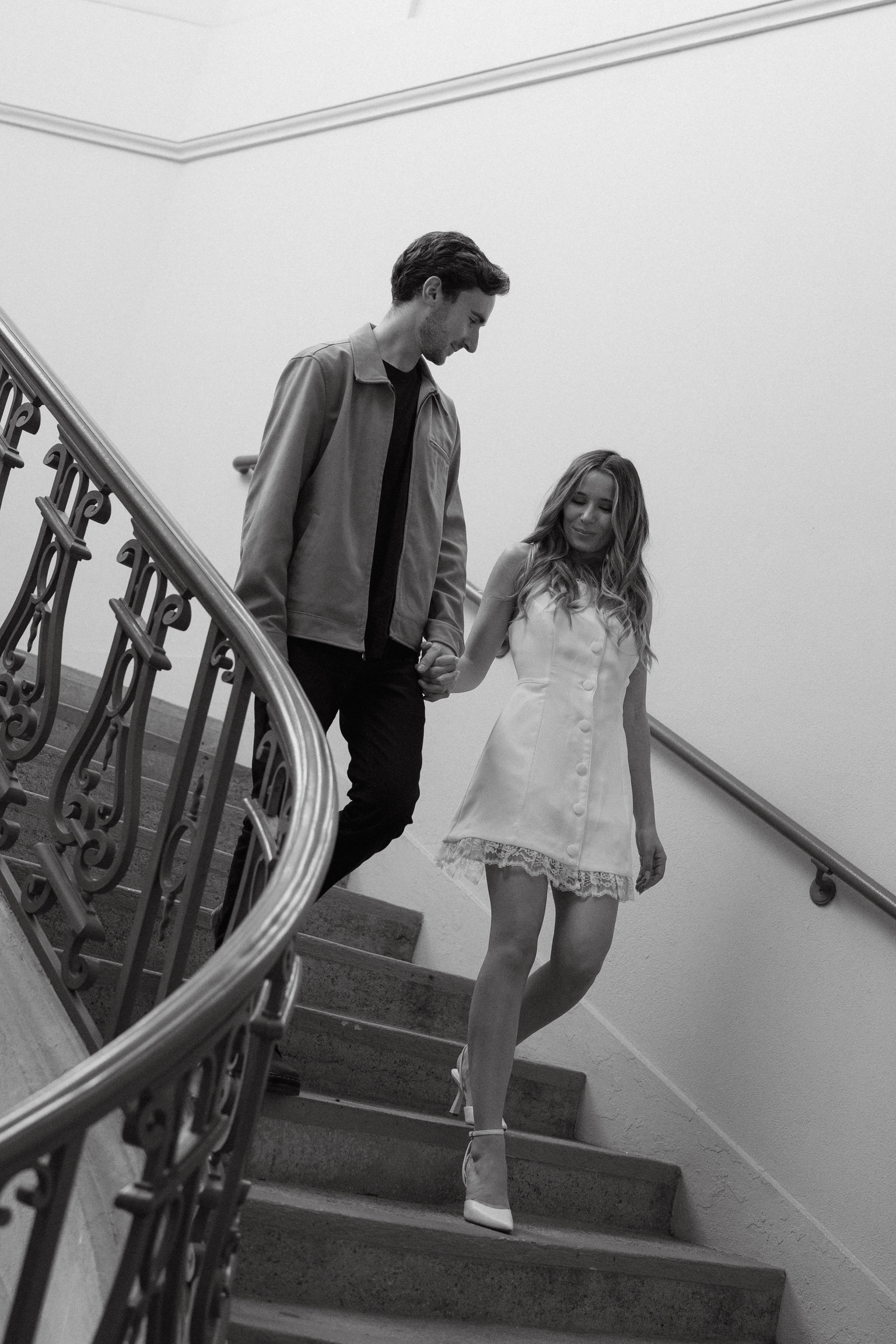 Descending the staircase hand in hand